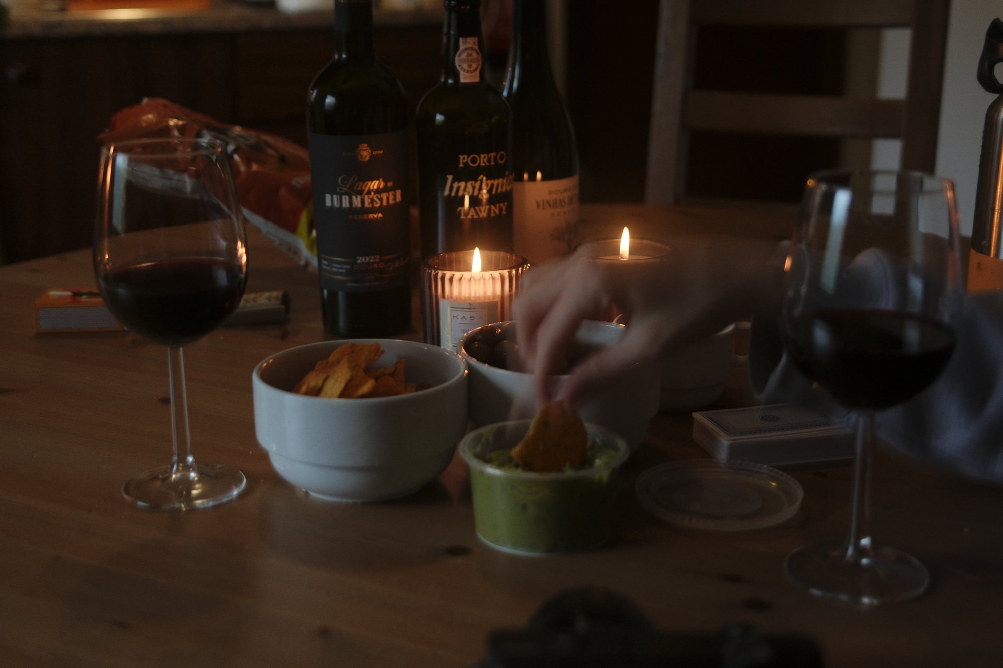 Candle-lit table with wine glasses
